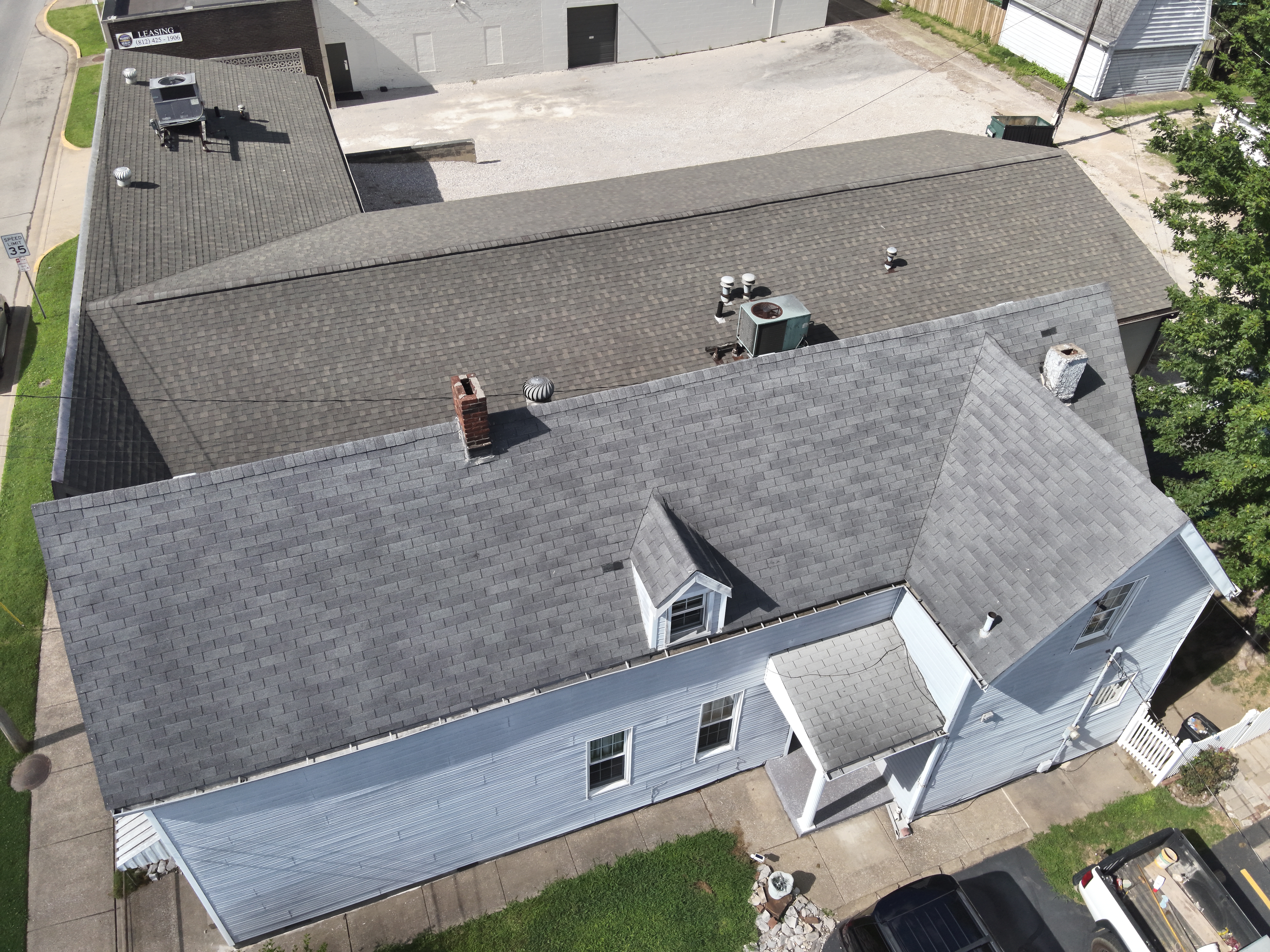 After - Tamko Titan XT Virginia Slate Roof and Norandex Premium Smoke Siding