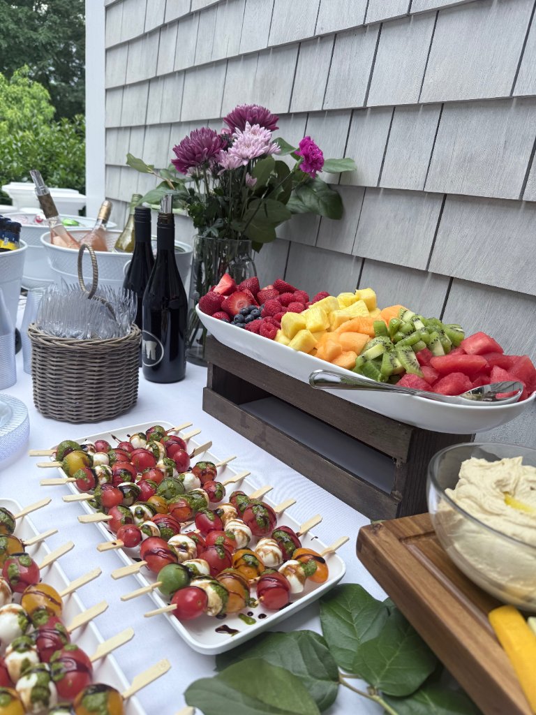 Catering fruit platter and caprese skewers