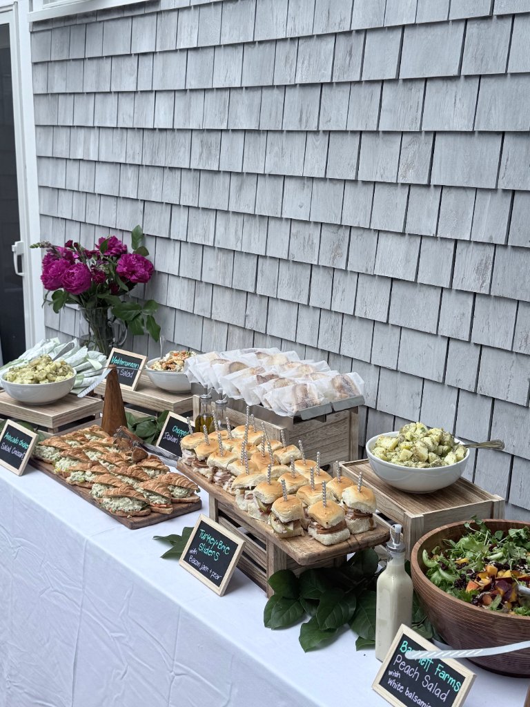 Catering sliders, croissants, and salads