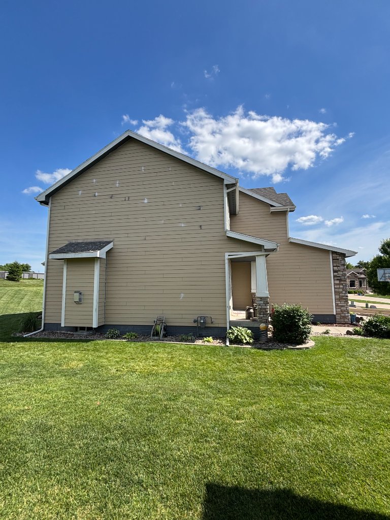 After - Side of home with new LP SmartSide siding
