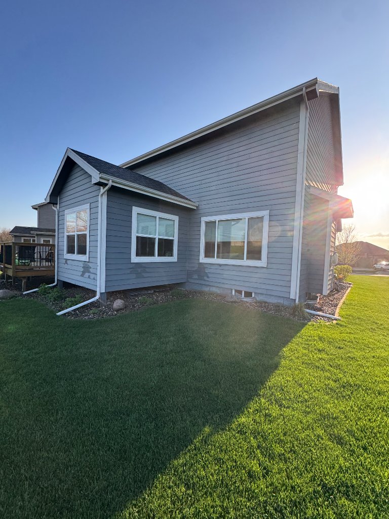Before - Additional view of worn siding