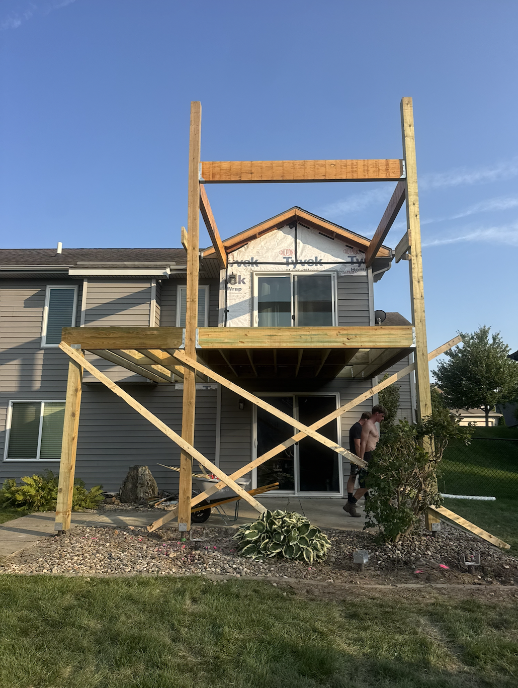 During construction - New covered deck framing with posts and roof rafters built by Akin Brothers deck builders in Ankeny, Iowa