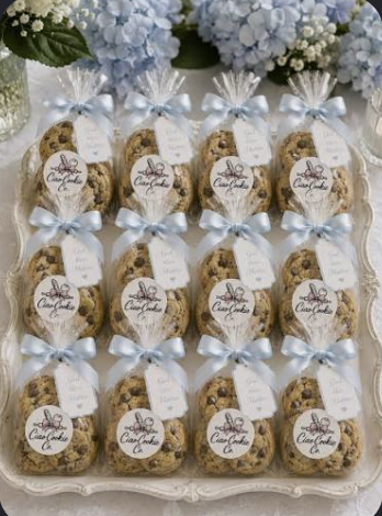 Elegant cookie favor grid with dusty-blue ribbons