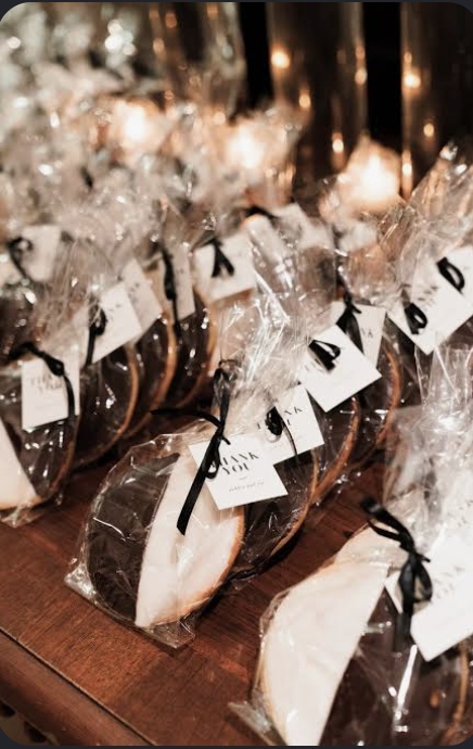 Black-and-white cookie favors with thank you tags