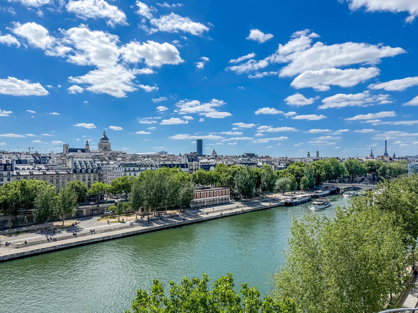 View from Quai d’Orléans across the Seine toward the Panthéon, Tour Montparnasse, and the Eiffel Tower