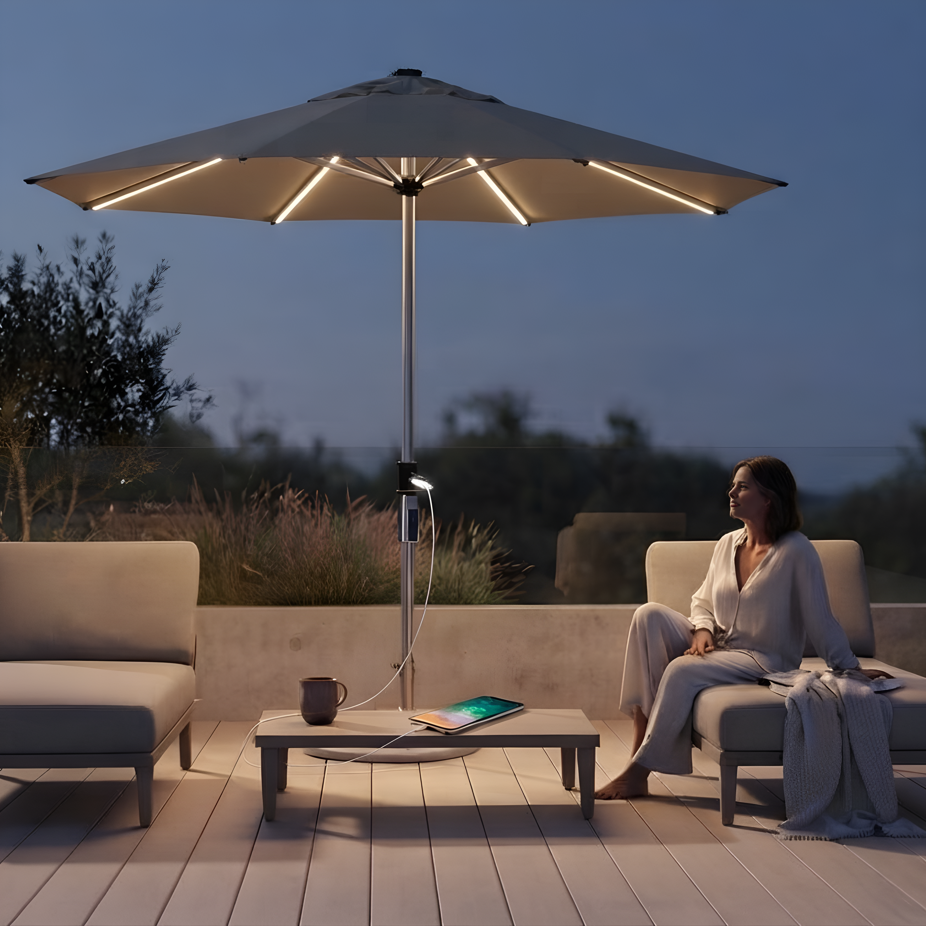 Solaris Solar Umbrella with integrated LED lighting on a patio at dusk