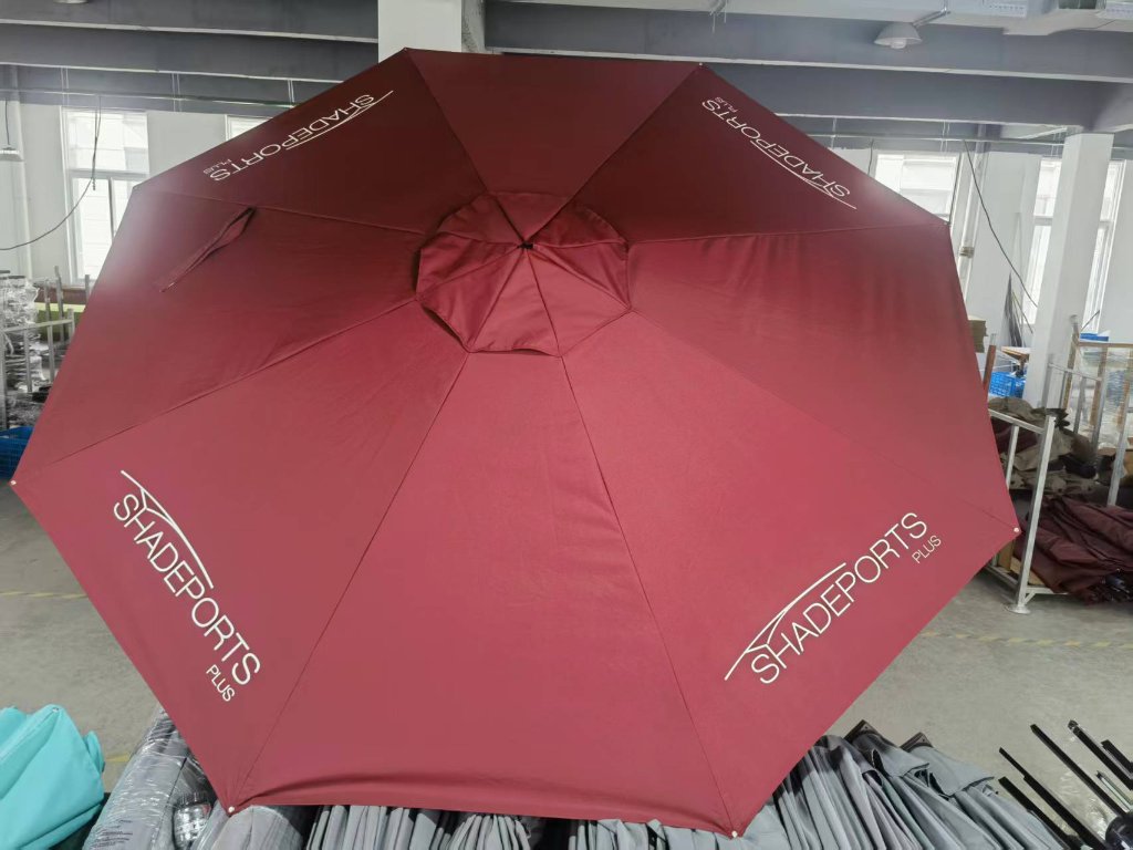 Burgundy branded umbrella top view