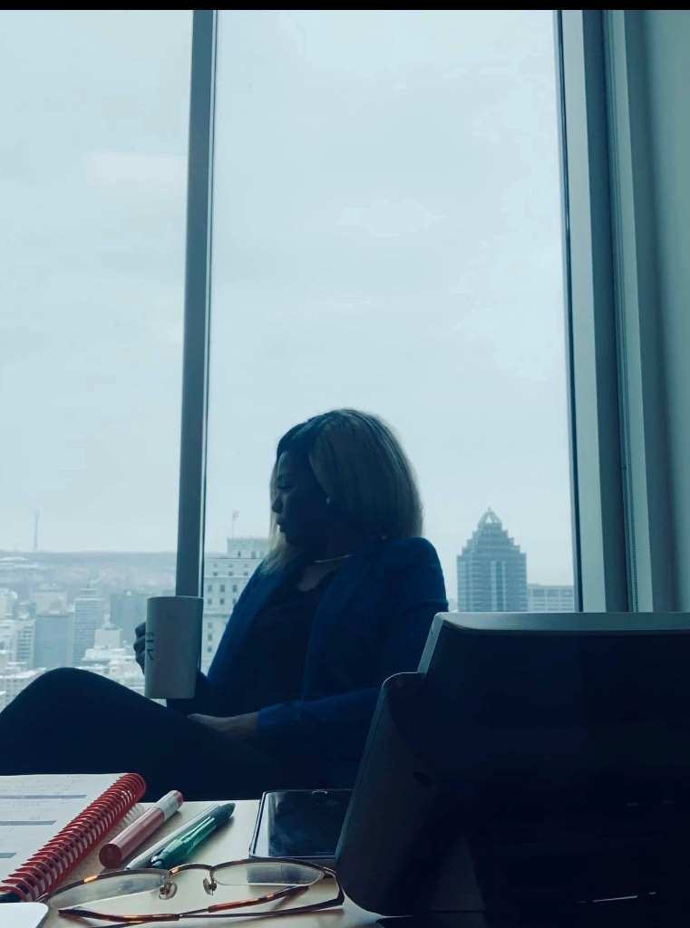 Constance consulting with team