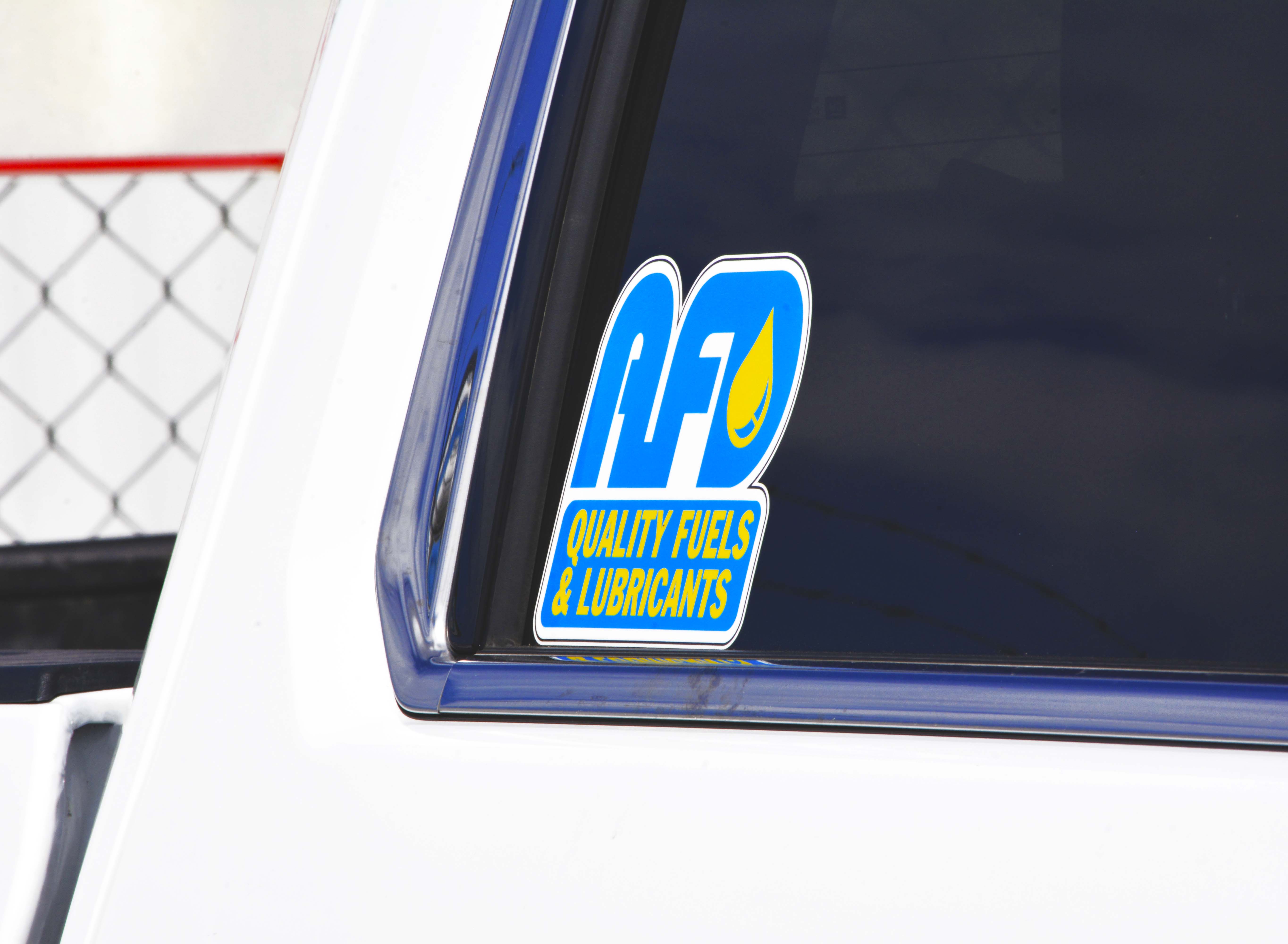 Close-up of the AFD Petroleum logo decal on a vehicle window