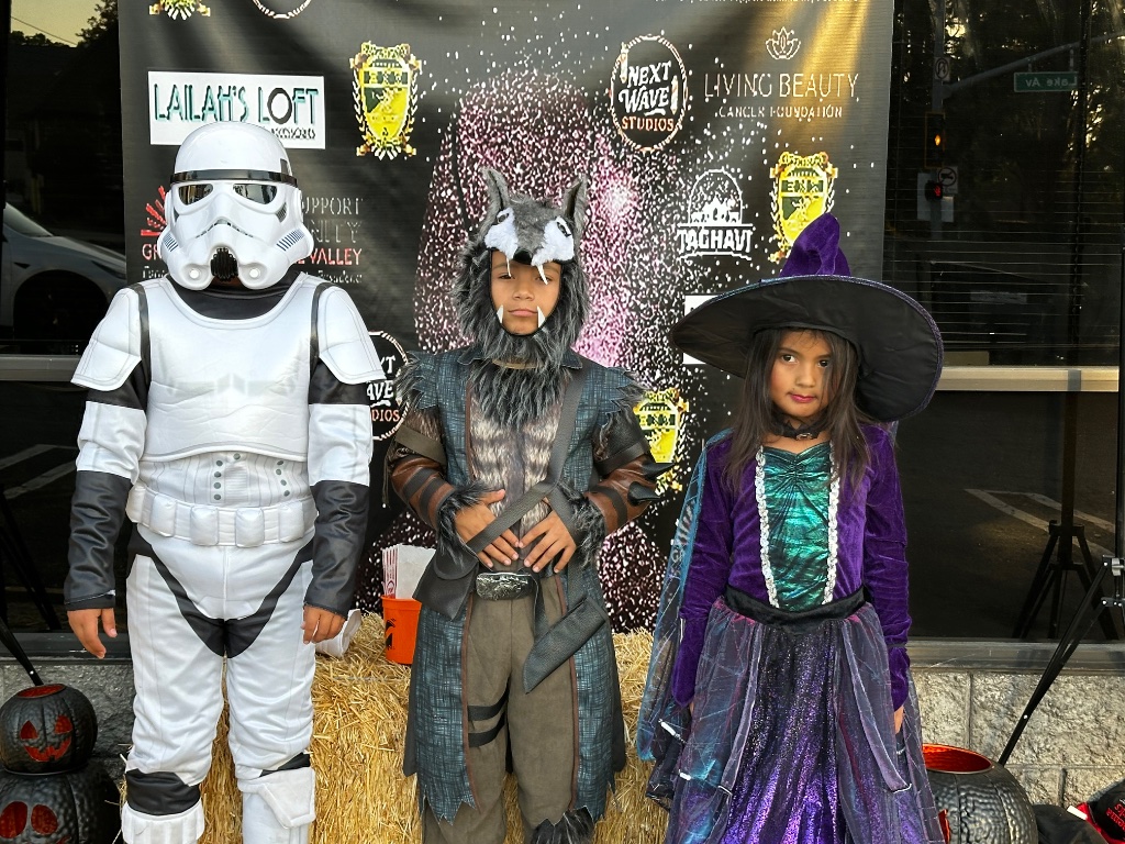 Halloween Trunk or Treat — Kids Posing at the Sponsor Wall