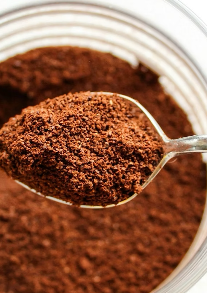 Soluble instant coffee powder on spoon