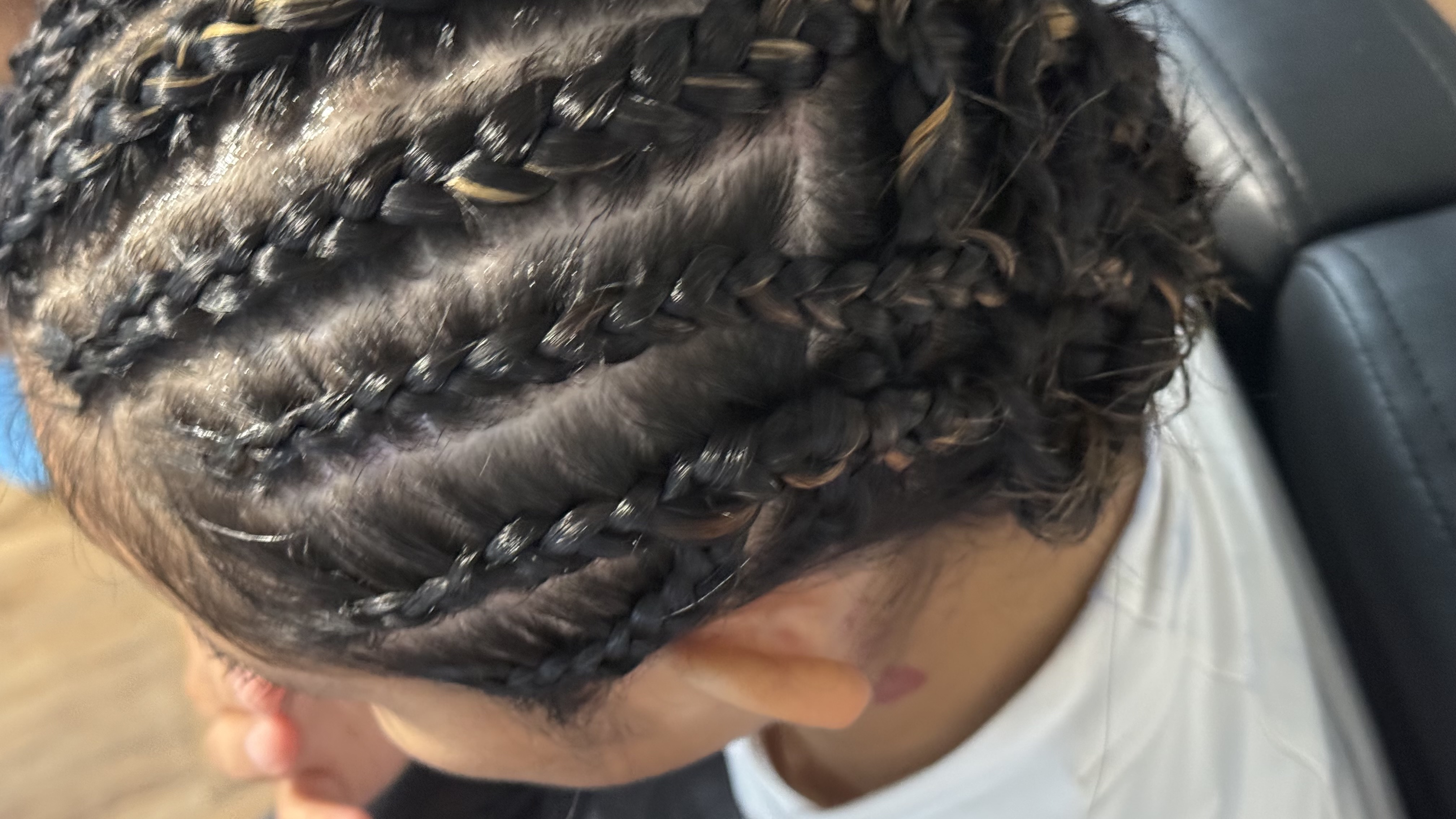 Sleek Cornrows · Pulled Back