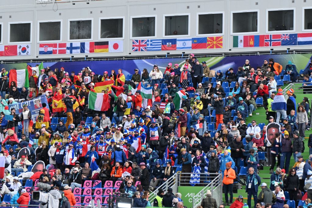 Para snowboarder sending snow spray at Milano Cortina 2026 Winter Paralympics