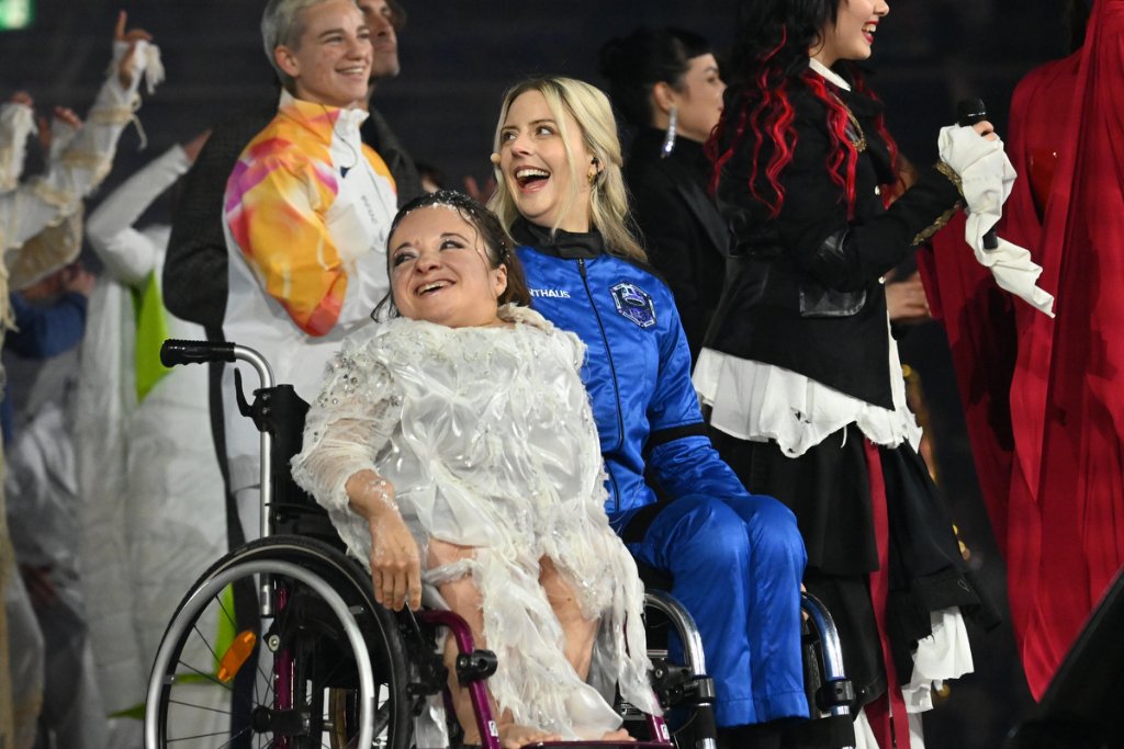 Performers including wheelchair user celebrate joyfully at the 2026 Winter Paralympics Opening Ceremony