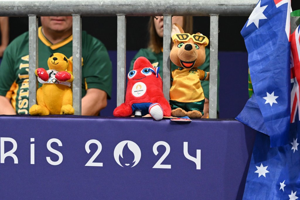 Paris 2024 and Australian mascot toys on the Boccia courtside railings