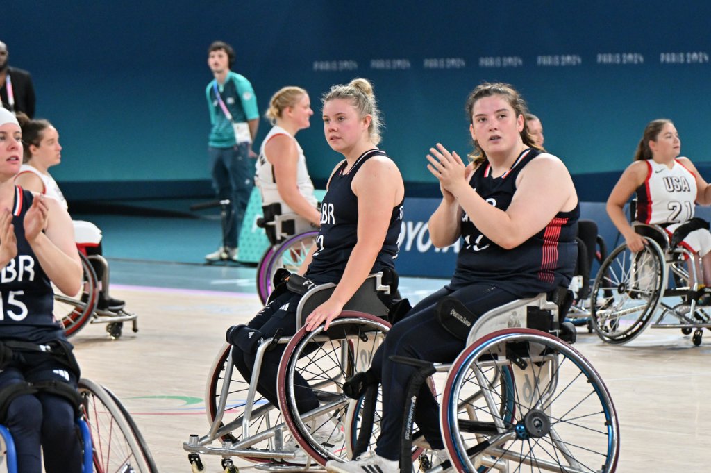 Two GBR players talking on court