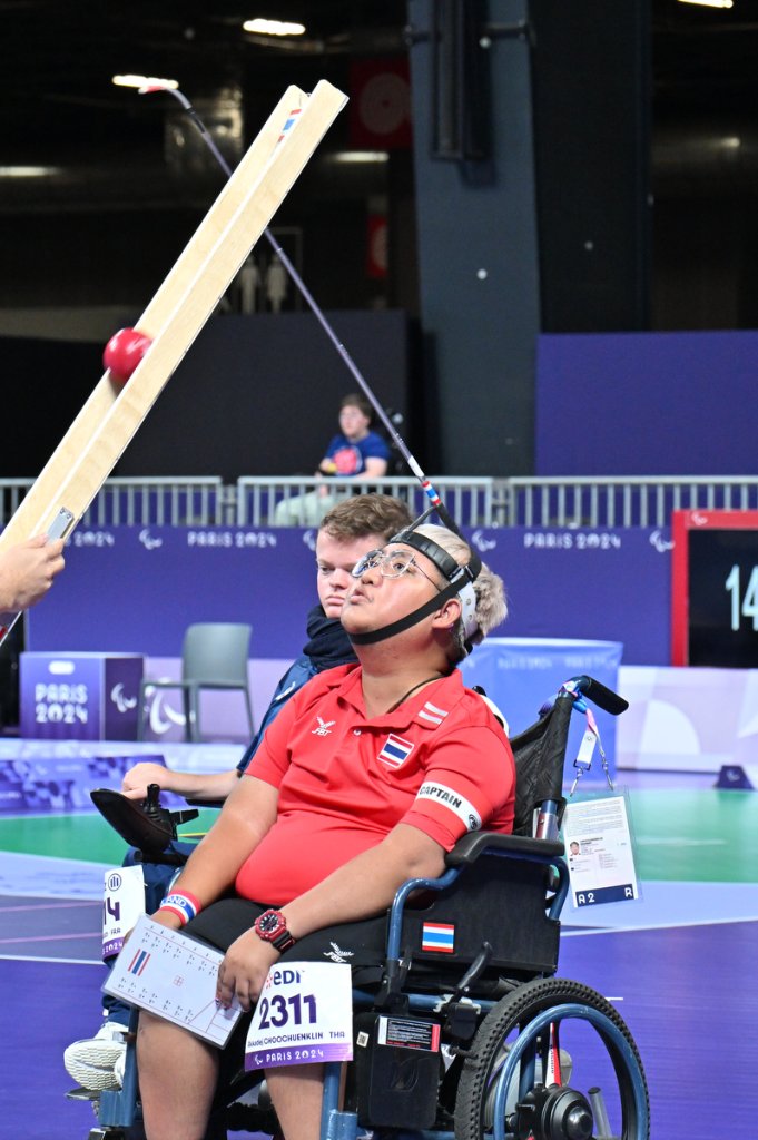 Thai BC3 Boccia athlete focused as ball rolls down ramp at Paris 2024