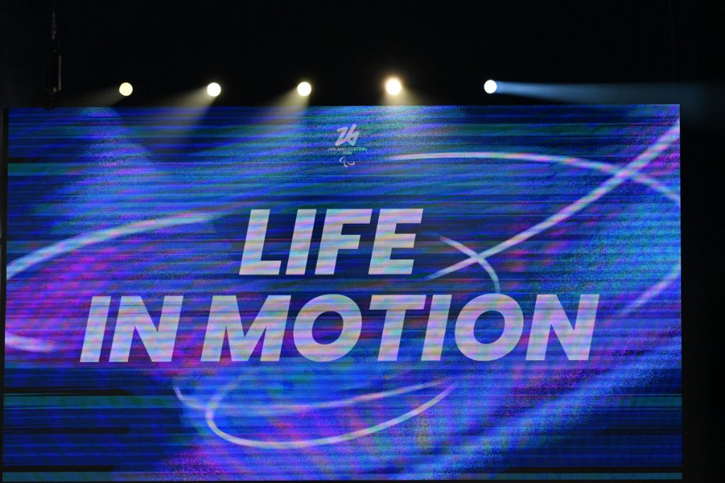 Life in Motion slogan displayed on the big screen at the 2026 Winter Paralympics Opening Ceremony