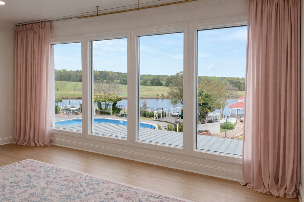 Magnolia Suite at Laurel Haven Estate — blush drapes and panoramic vineyard, pool and pond views in Lancaster SC