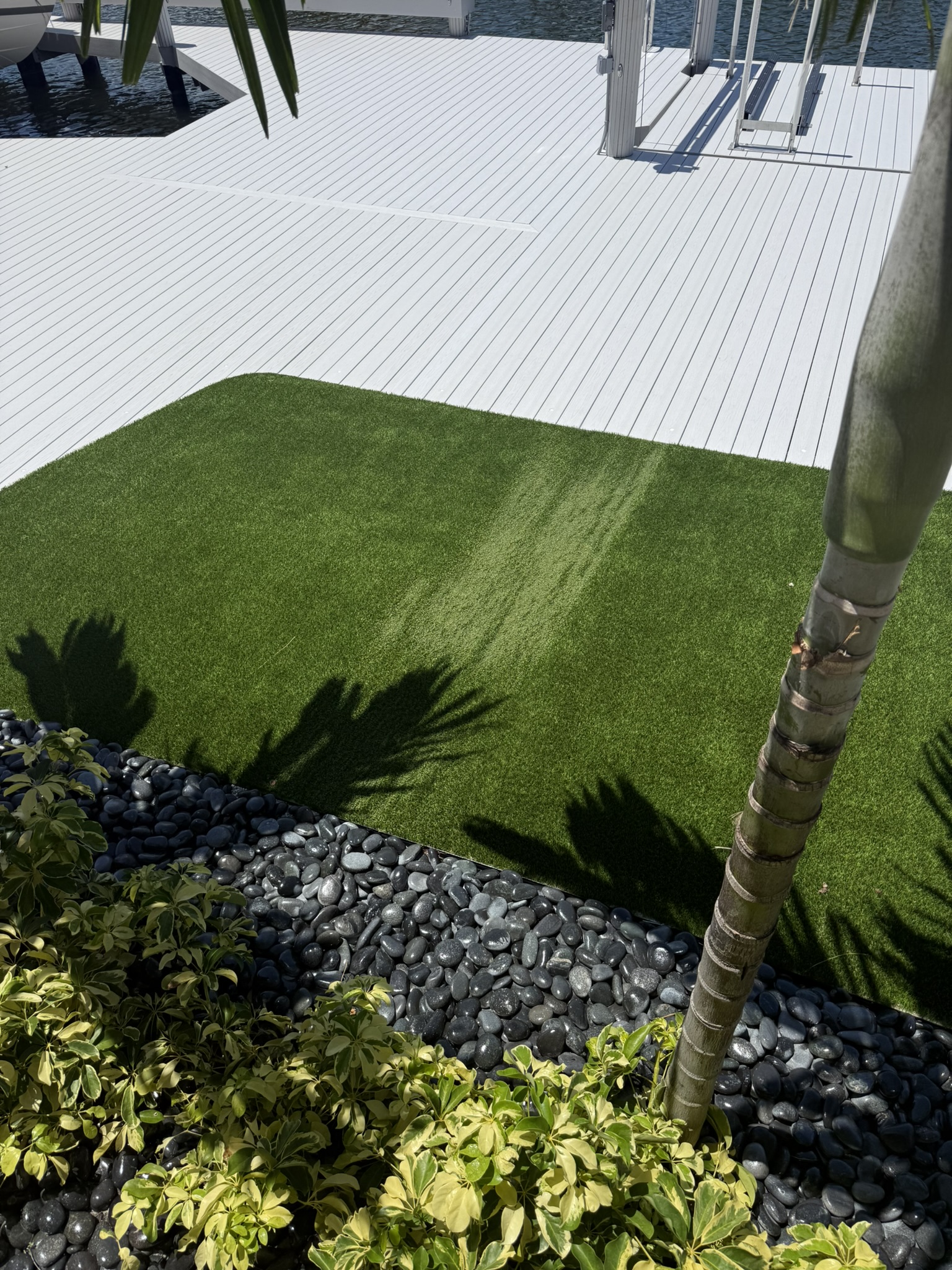 Artificial turf burn pattern on Marco Island property caused by reflective Low-E window