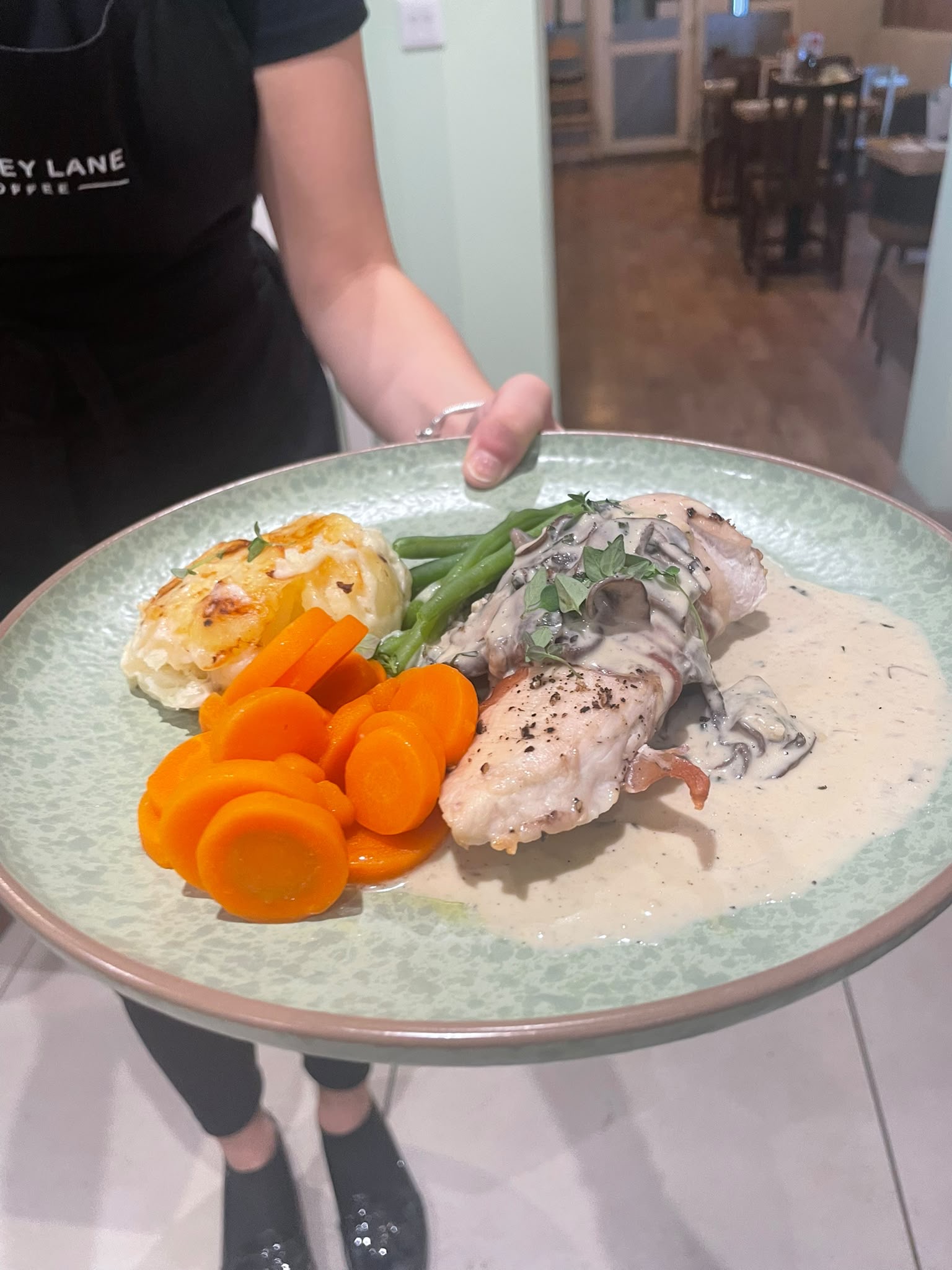 Chicken wrapped in prosciutto with dauphinoise potatoes