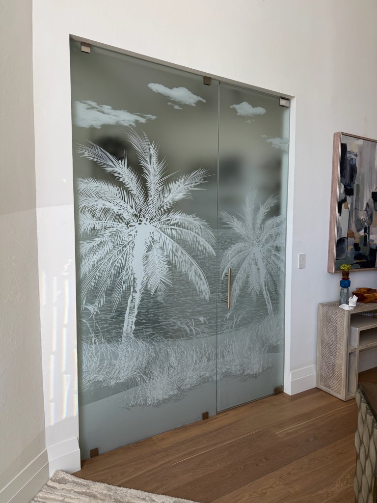 Palm artwork across a large interior window
