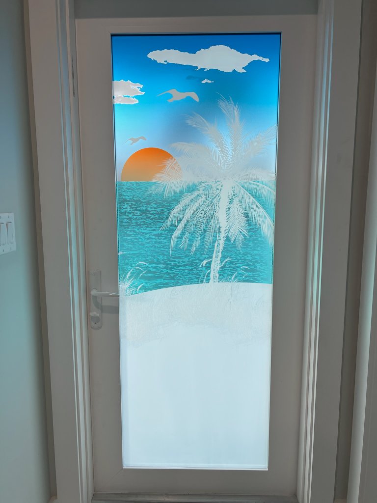 Colorful tropical coastal artwork on a narrow glass door