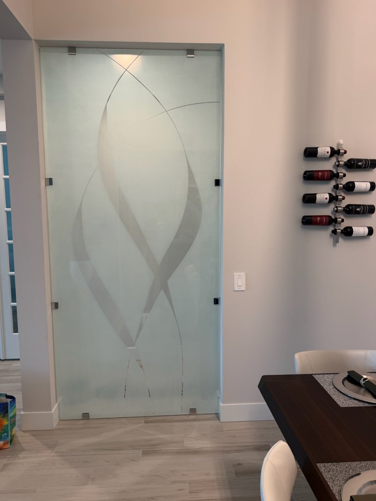 Sweeping frost and clear accents on an interior glass door