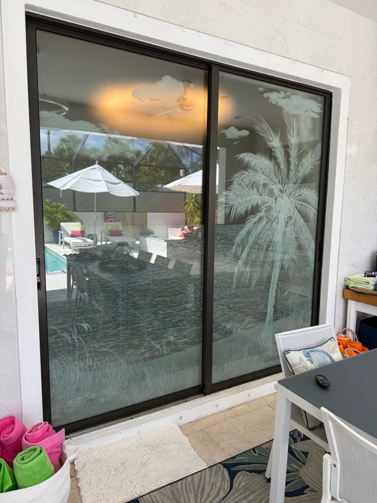 Palm artwork across sliding glass doors
