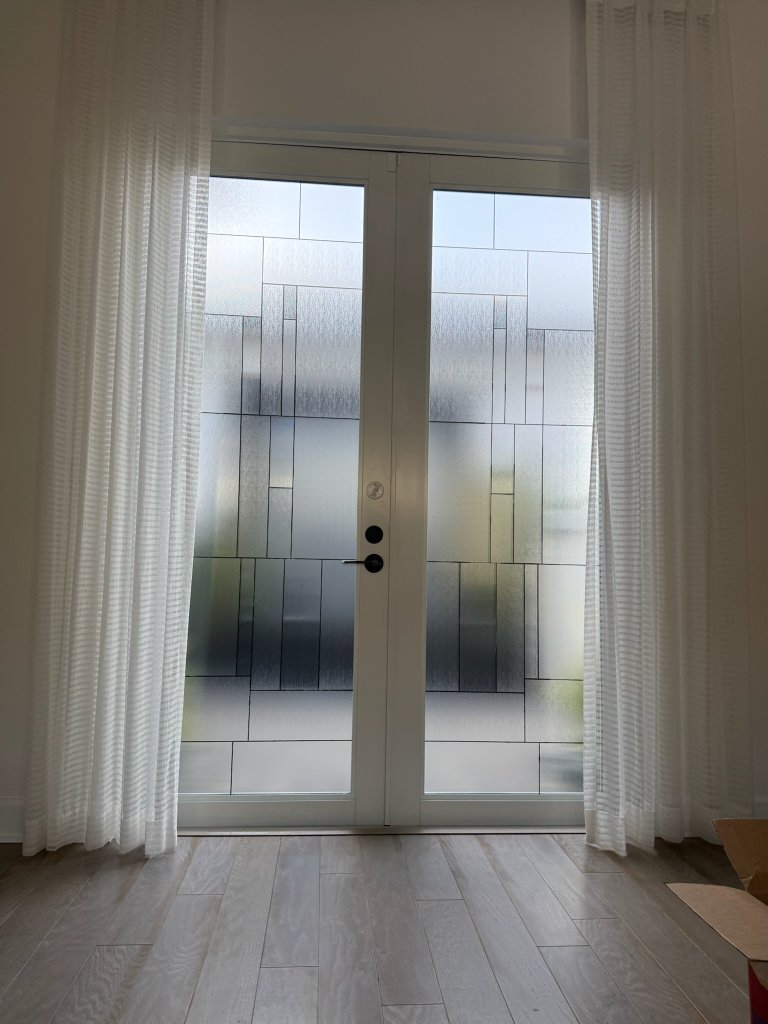Vertical decorative stripes on double entry doors