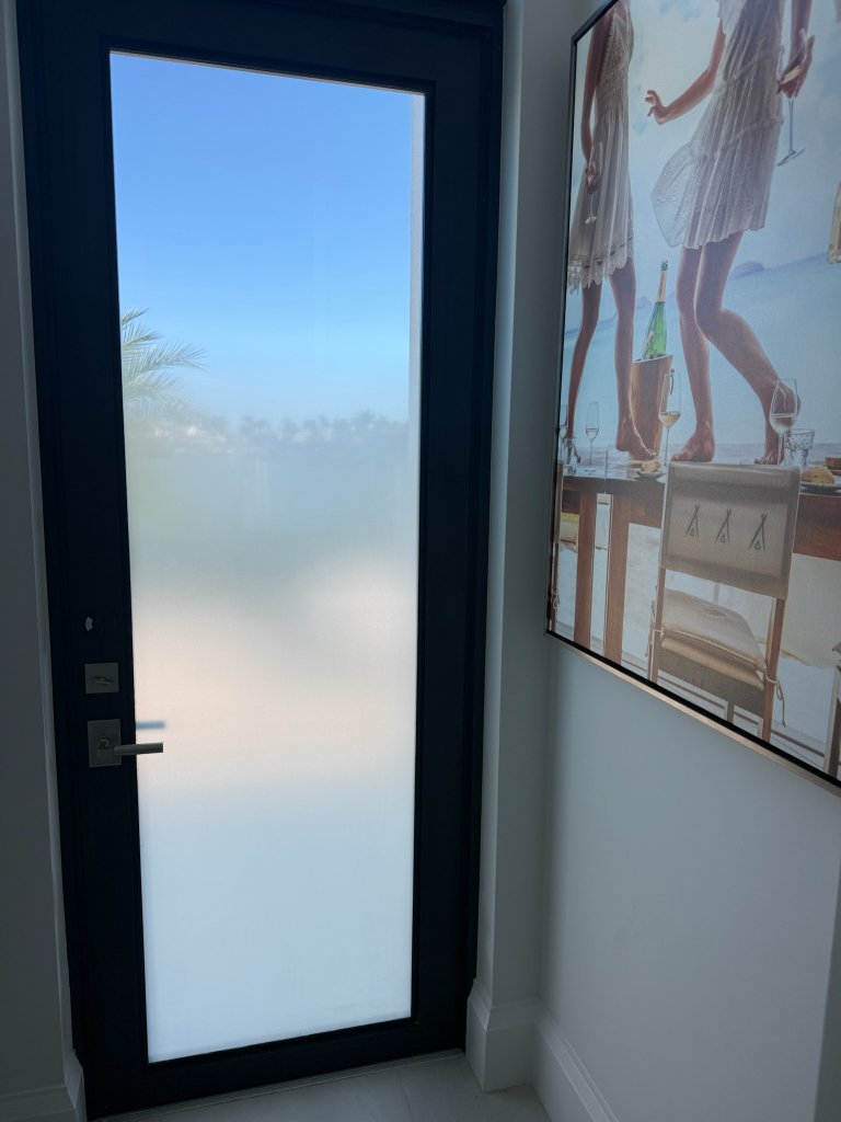 Frosted glass privacy treatment on an interior door