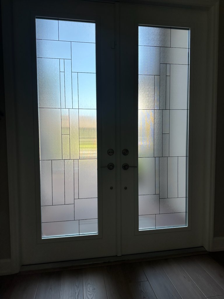 Rectangular linework on frosted double entry doors