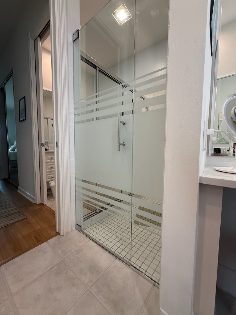 Frosted horizontal bands on a bathroom privacy door