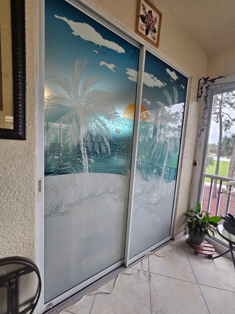 Coastal scene artwork across sliding glass doors