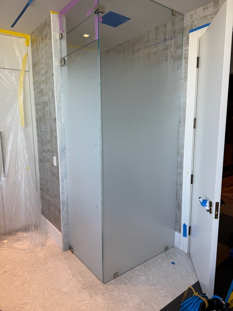 Frosted glass enclosure during installation