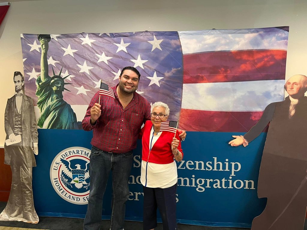 Steve Avila with his grandmother Maria Laura at her naturalization ceremony at USCIS West Palm Beach