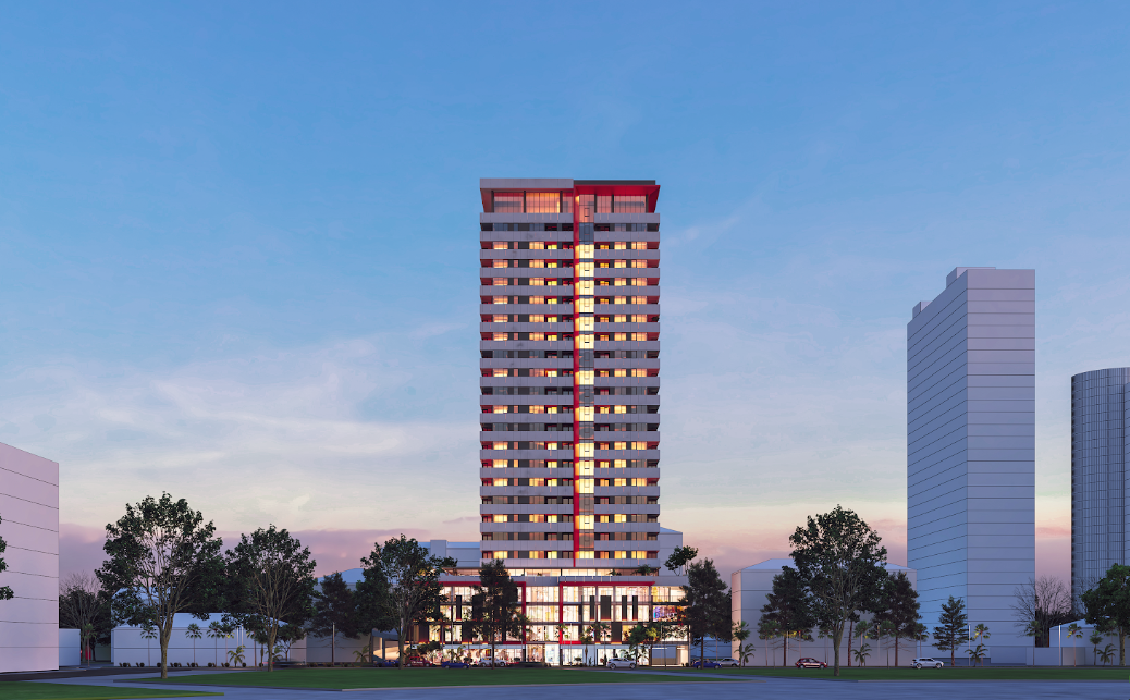 Mardi Stadium tower facade at twilight, seen from street level
