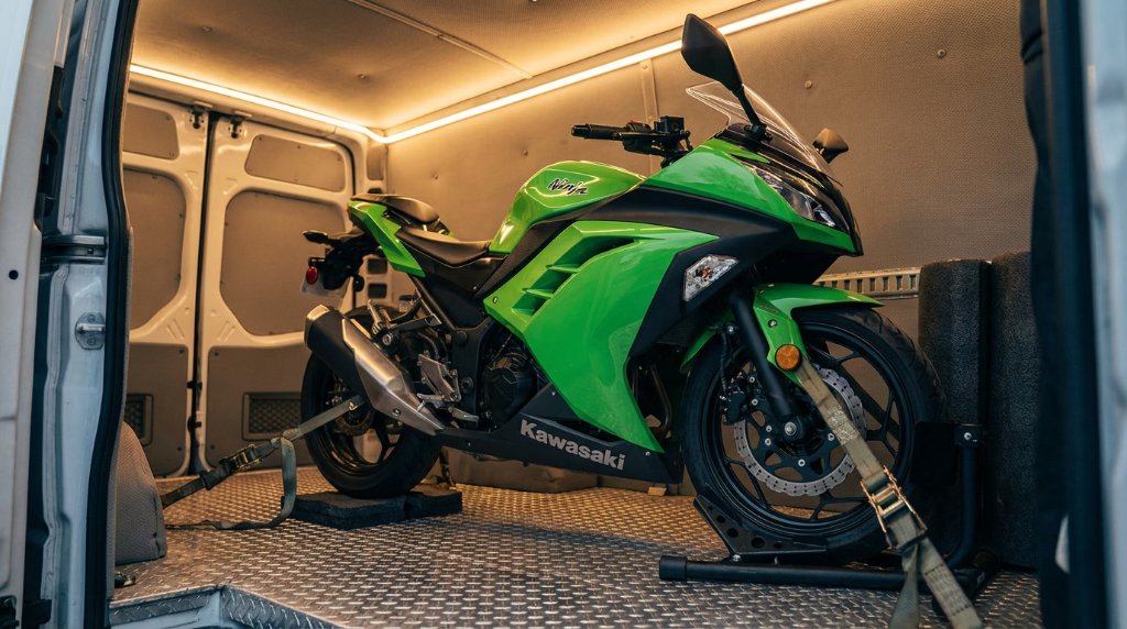 Motorcycle in enclosed transport van