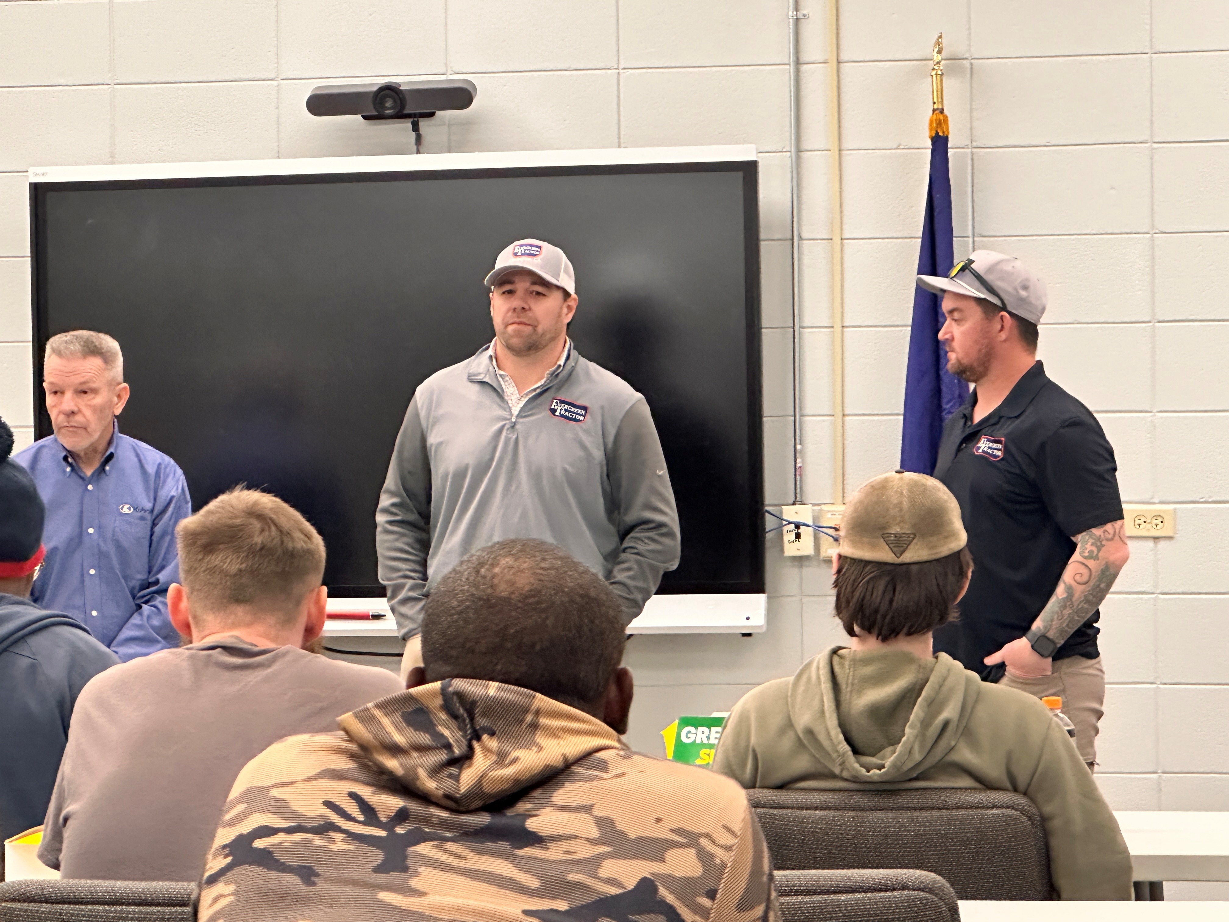 Evergreen Tractor staff leading an operator training session for government customers