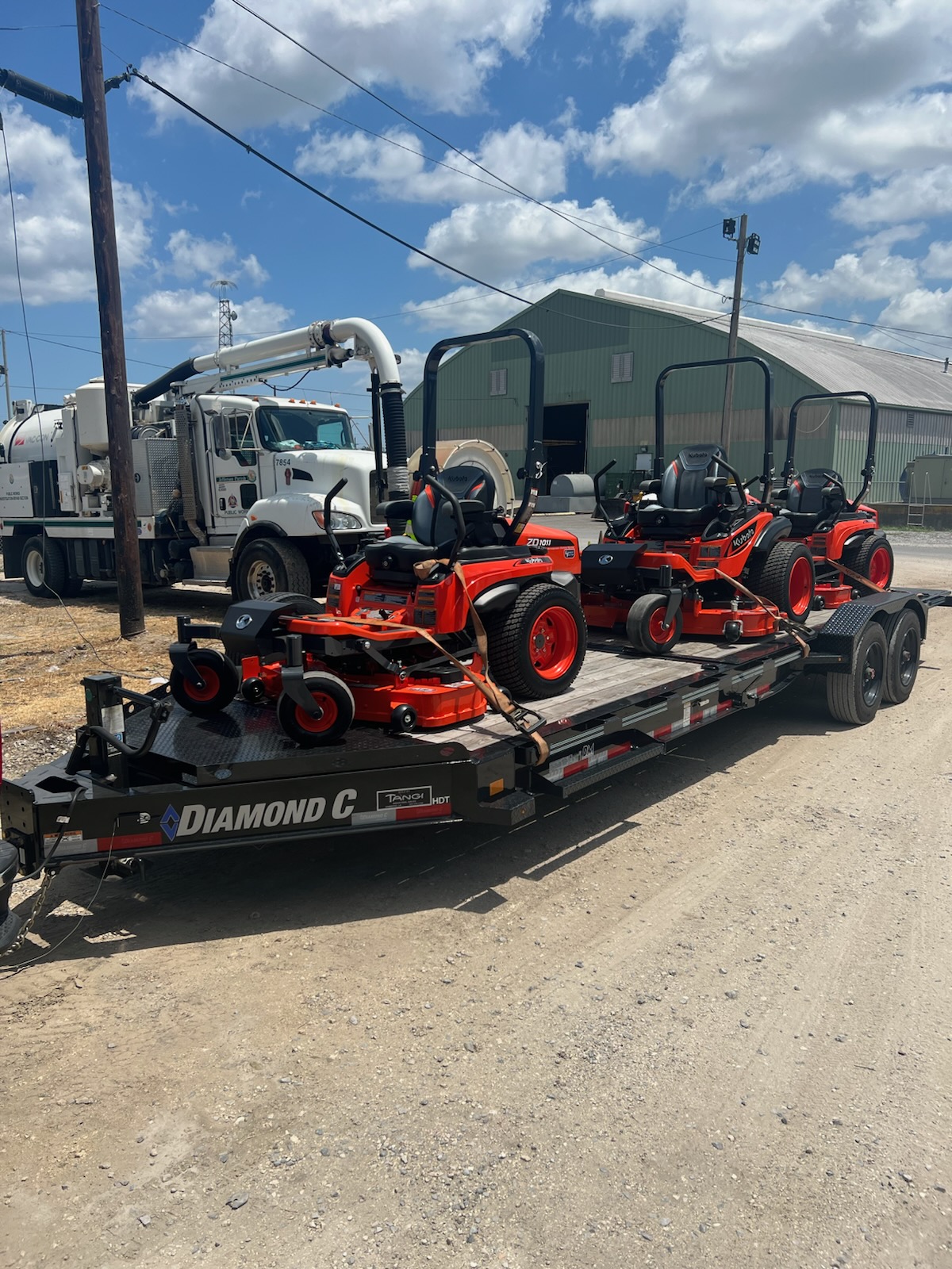 Delivery of three Kubota ZD1011 zero-turn mowers to a public works department