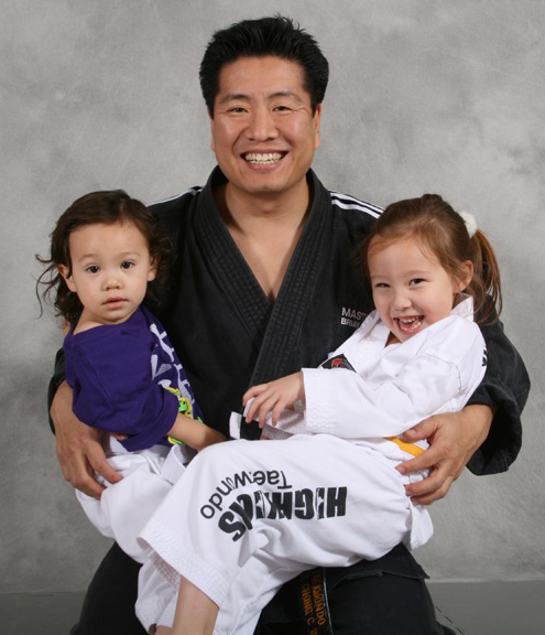 Master Brian teaching students at Highkicks Taekwondo