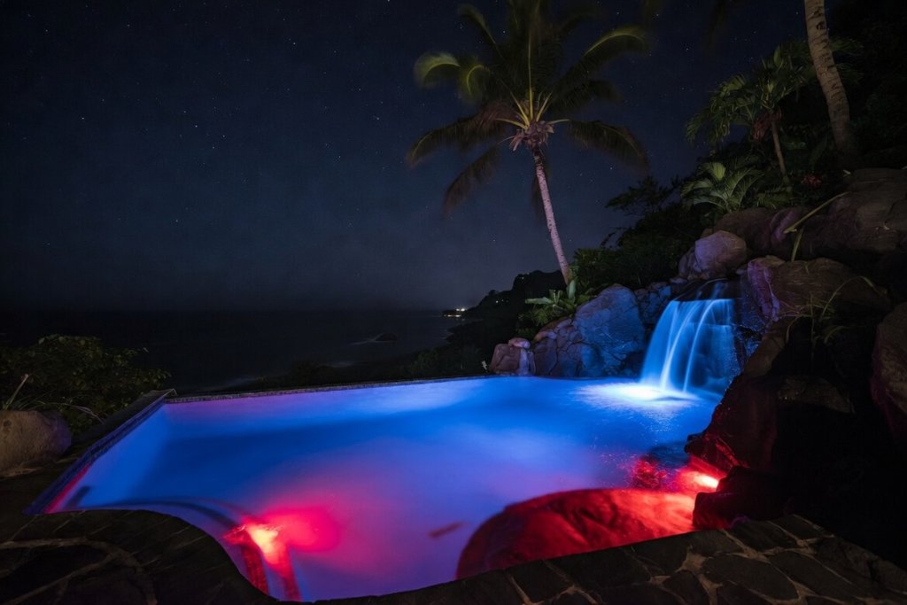 Illuminated pool at evening