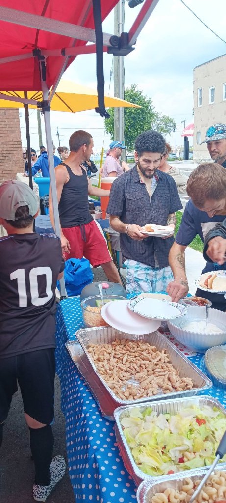 Sharing food, conversation and community connection.