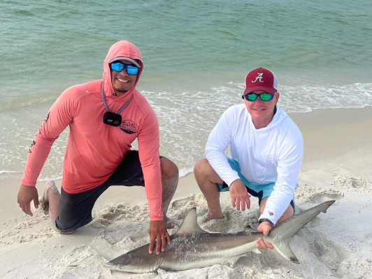 Charter guest Sal T. with a catch on a Pensacola land-based charter