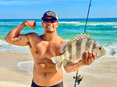 Capt. Arinton with a sheepshead caught on a Pensacola beach charter