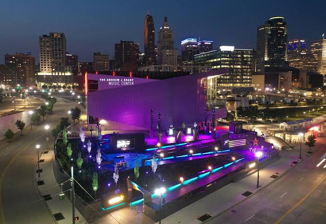 Cincinnati Black Music Walk of Fame lit up at night next to the Andrew J. Brady Music Center