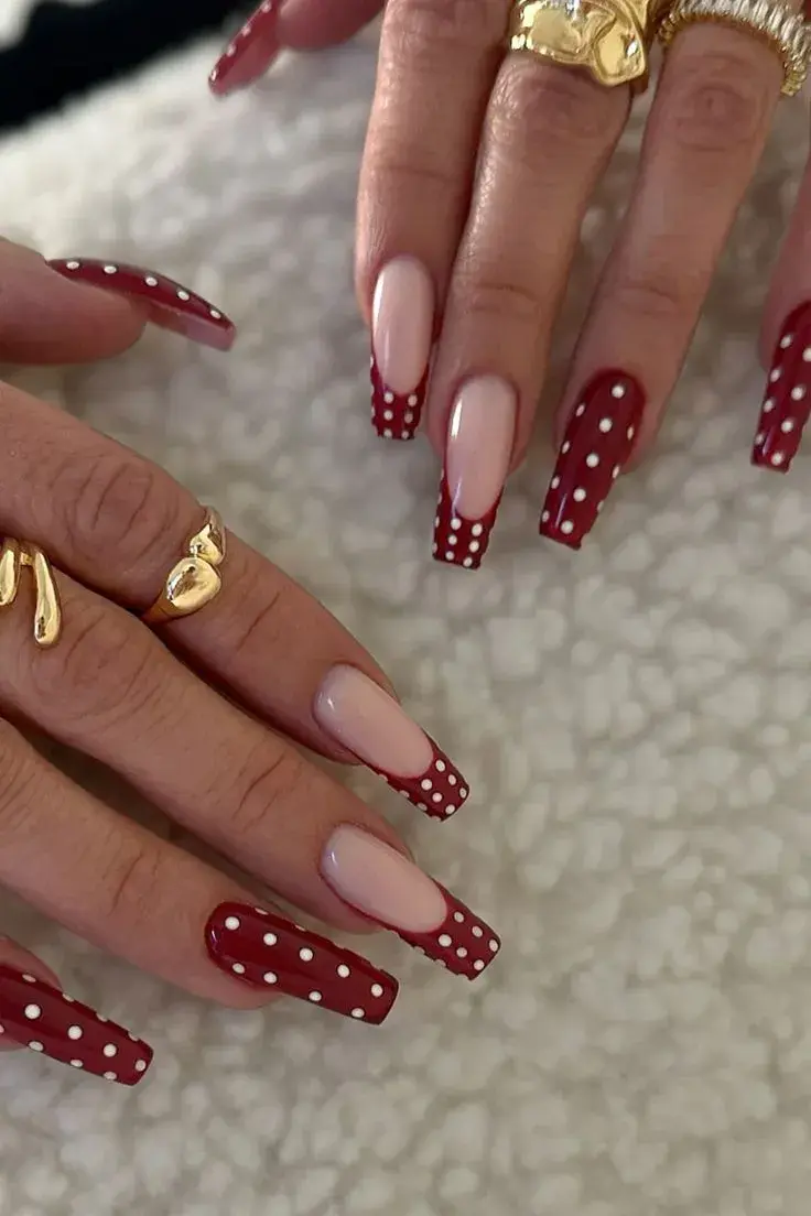 Dark red French coffin nails with white polka dots
