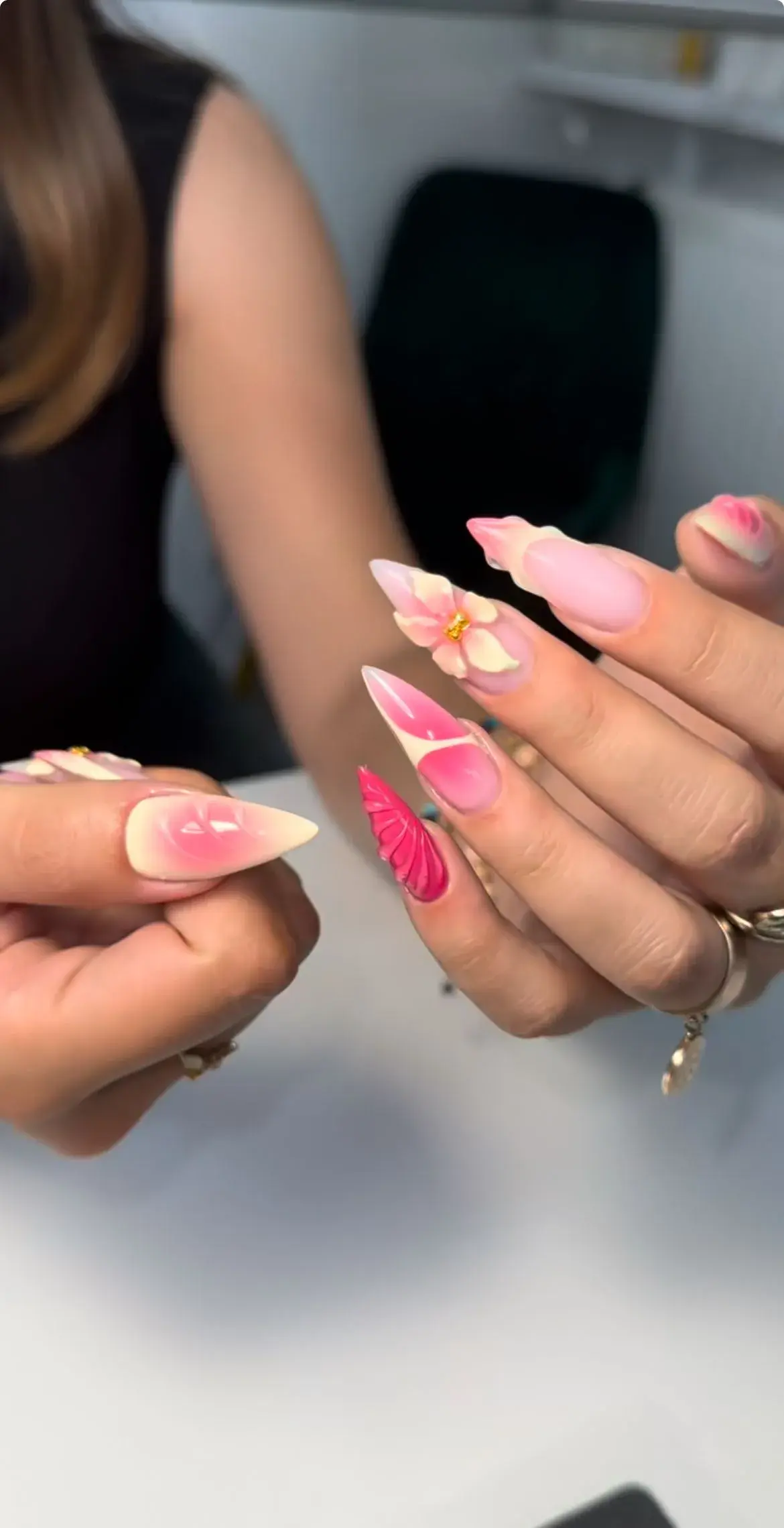 Pink ombre stiletto nails with 3D flower and leaf art
