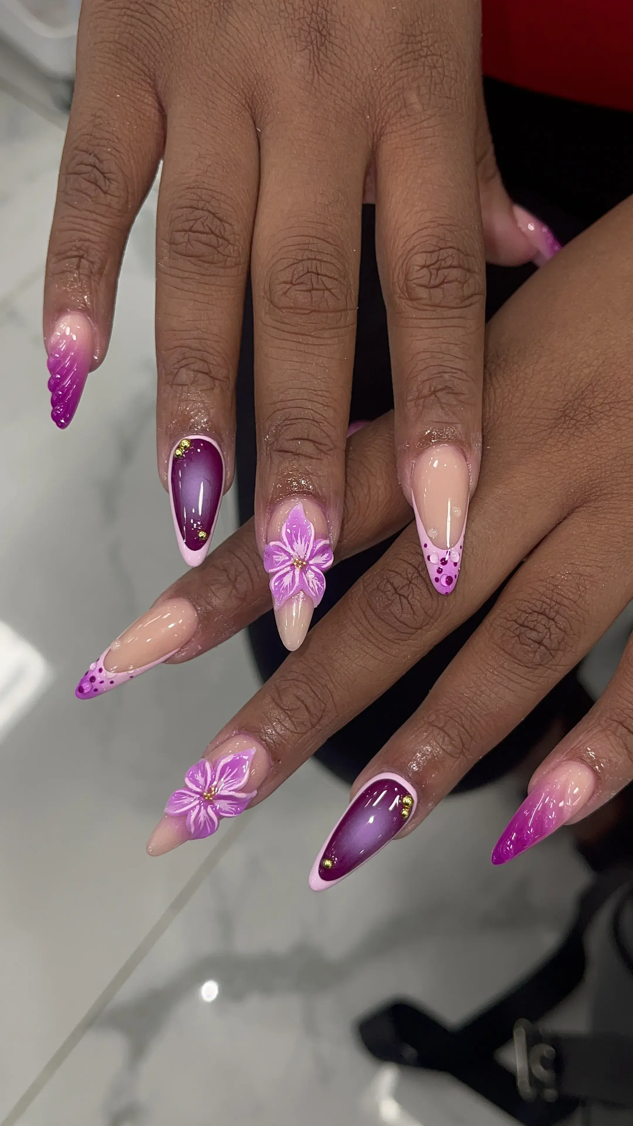 Purple ombre stiletto nails with 3D flowers