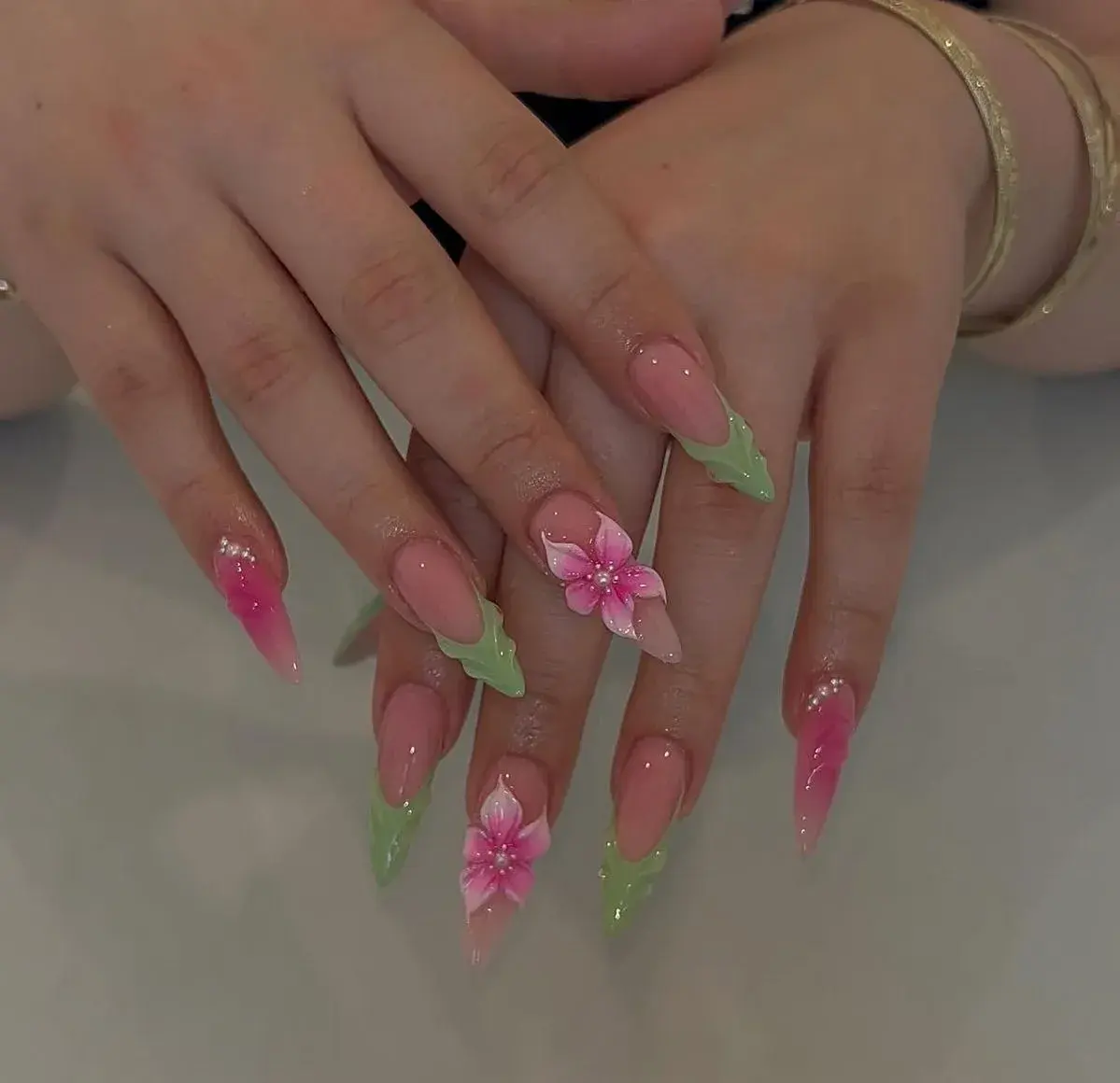 Almond nails with pink and green 3D flower art